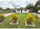 Charming single story home with a well maintained lawn at 28301 N Twin Lakes Dr, Punta Gorda, FL 33955