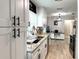 Modern kitchen with granite countertops and white cabinets at 28301 N Twin Lakes Dr, Punta Gorda, FL 33955