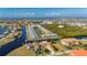 Wide aerial shot showcasing waterfront homes with boat docks in a vibrant coastal community at 3329 Purple Martin Dr # 113, Punta Gorda, FL 33950