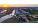 Aerial view of condos with boat docks, canal access, and colorful exterior paint colors at 3329 Purple Martin Dr # 113, Punta Gorda, FL 33950