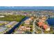 High aerial perspective displaying a vast network of canals and colorful residential properties at 3329 Purple Martin Dr # 113, Punta Gorda, FL 33950