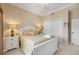 Cozy bedroom with a window, closet and ceiling fan in a neutral palette with good natural light at 3329 Purple Martin Dr # 113, Punta Gorda, FL 33950