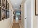Inviting hallway with tile floors leads to a bright living area with water views at 3329 Purple Martin Dr # 113, Punta Gorda, FL 33950