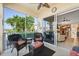 Relaxing screened lanai offers waterfront view and seamless transition to the indoor living space at 3329 Purple Martin Dr # 113, Punta Gorda, FL 33950