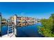 Picturesque waterfront featuring boat docks and colorful waterfront residences at 3329 Purple Martin Dr # 113, Punta Gorda, FL 33950
