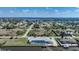 Scenic aerial view of the property in a waterfront community with access to a serene bay at 3339 Desoto Dr, Punta Gorda, FL 33983