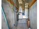 Utility room features HVAC system, cement walls and ceiling with exposed supports at 3339 Desoto Dr, Punta Gorda, FL 33983
