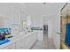 Bathroom featuring a vanity with lots of storage and bright lighting at 3339 Desoto Dr, Punta Gorda, FL 33983