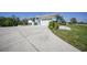 Charming home with an attached garage and concrete driveway at 3339 Desoto Dr, Punta Gorda, FL 33983