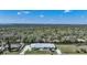Charming single-story home with a manicured lawn and lush landscaping at 3339 Desoto Dr, Punta Gorda, FL 33983