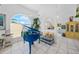 Bright living room featuring tile floors, a blue piano, vaulted ceilings, and arched windows at 3339 Desoto Dr, Punta Gorda, FL 33983