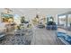 Bright living room boasts tile floors, high ceilings, and refined furniture, perfect for relaxation and entertaining at 3339 Desoto Dr, Punta Gorda, FL 33983