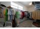 Walk-in closet with ample shelving and hanging space for clothes and accessories at 3339 Desoto Dr, Punta Gorda, FL 33983