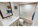 Cozy bathroom featuring a vanity, frosted glass shower, and light gray floors at 3830 Bal Harbor Blvd # 6, Punta Gorda, FL 33950