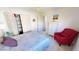 Bright bedroom featuring a ceiling fan, patterned bedspread and a large closet at 3830 Bal Harbor Blvd # 6, Punta Gorda, FL 33950