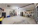 Spacious garage with shelving, storage, and room for bikes and a refrigerator at 3830 Bal Harbor Blvd # 6, Punta Gorda, FL 33950