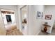 Hallway with views to patio, living area, and backyard access at 3830 Bal Harbor Blvd # 6, Punta Gorda, FL 33950