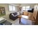 Living Room featuring a sofa, shutters, built in cabinetry and desk at 3830 Bal Harbor Blvd # 6, Punta Gorda, FL 33950