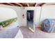 Charming outdoor brick patio with convenient access to both the garage and backyard at 3830 Bal Harbor Blvd # 6, Punta Gorda, FL 33950