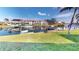 Beautiful waterfront view featuring docks, boats, and stunning home reflections at 3830 Bal Harbor Blvd # 6, Punta Gorda, FL 33950