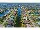 Property with a boat lift and screened pool in waterfront community, offering the best of Florida's coastal living at 400 Coronado Dr, Punta Gorda, FL 33950