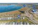 Aerial view showcasing community, lakefront location, and various amenities at 43104 Lakeside Way, Punta Gorda, FL 33982