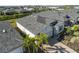Aerial view showcasing the home's curb appeal and landscaping at 43104 Lakeside Way, Punta Gorda, FL 33982
