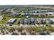 Aerial view of house and neighborhood, highlighting location and landscape at 43104 Lakeside Way, Punta Gorda, FL 33982