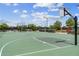 Full-size basketball court with ample space at 43104 Lakeside Way, Punta Gorda, FL 33982
