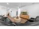 Spacious living room featuring a modern media console and comfortable seating at 43104 Lakeside Way, Punta Gorda, FL 33982
