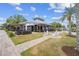 Inviting outdoor patio area with comfortable seating and a view at 43104 Lakeside Way, Punta Gorda, FL 33982