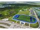 Community sports complex featuring a football field and track at 43104 Lakeside Way, Punta Gorda, FL 33982