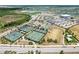 Well-maintained tennis courts with ample space for play at 43104 Lakeside Way, Punta Gorda, FL 33982