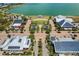 Community town square with solar-paneled buildings and a waterfront view at 43104 Lakeside Way, Punta Gorda, FL 33982