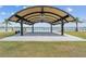 Scenic waterfront gazebo with seating overlooking the water at 43104 Lakeside Way, Punta Gorda, FL 33982