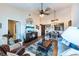 Spacious living room with wood floors, dining area and natural light at 5738 Sabal Trace Dr # 204B57, North Port, FL 34287