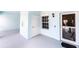 Outdoor area with a white door and a screened door, perfect for relaxing and enjoying the weather at 5738 Sabal Trace Dr # 204B57, North Port, FL 34287
