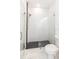 Bathroom with hexagon floor tile and glass shower at 706 W Madison St, Plant City, FL 33563