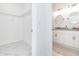 Spacious bathroom with walk-in closet and marble floor at 706 W Madison St, Plant City, FL 33563