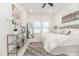 Bright bedroom with a king-size bed and marble flooring at 706 W Madison St, Plant City, FL 33563