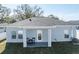 House exterior showcasing back patio at 706 W Madison St, Plant City, FL 33563