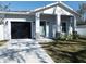 House exterior with attached garage at 706 W Madison St, Plant City, FL 33563