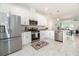 Modern kitchen with white cabinets and stainless steel appliances at 706 W Madison St, Plant City, FL 33563