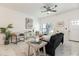 Bright living room with comfy seating and large windows at 706 W Madison St, Plant City, FL 33563