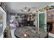 Bar room featuring Green Bay Packers decor, a wet bar, and a table and chair set at 9 Logan St, Port Charlotte, FL 33954