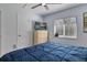 The room has neutral-colored walls, bright white trim, and a large window for natural light at 9 Logan St, Port Charlotte, FL 33954
