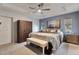 Spacious main bedroom featuring trey ceilings, a sitting area, and natural light at 9 Logan St, Port Charlotte, FL 33954