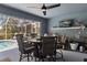 Covered patio featuring a table and chair set and a swimming pool at 9 Logan St, Port Charlotte, FL 33954