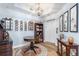Entryway with hardwood floors, decorative walls and accent furniture at 91 Vivante Blvd # 402/9142, Punta Gorda, FL 33950