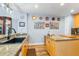Kitchen with lots of decorations on the walls and granite countertops at 91 Vivante Blvd # 402/9142, Punta Gorda, FL 33950